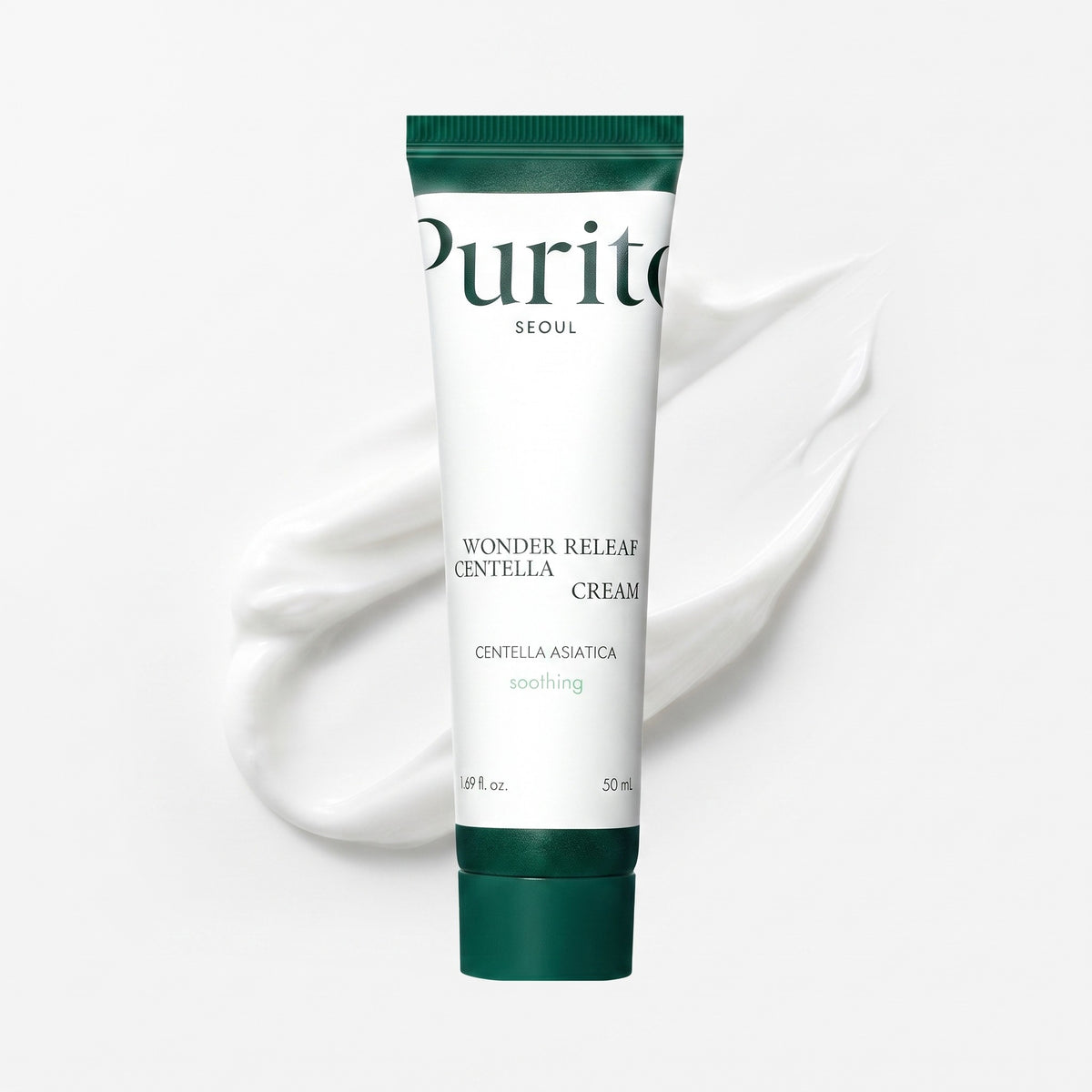 A 50ml squeeze tube of Purito Seoul Wonder Relief Centella Cream, featuring a white body with dark green caps and text, set against a clean white background with a decorative swirl of cream.